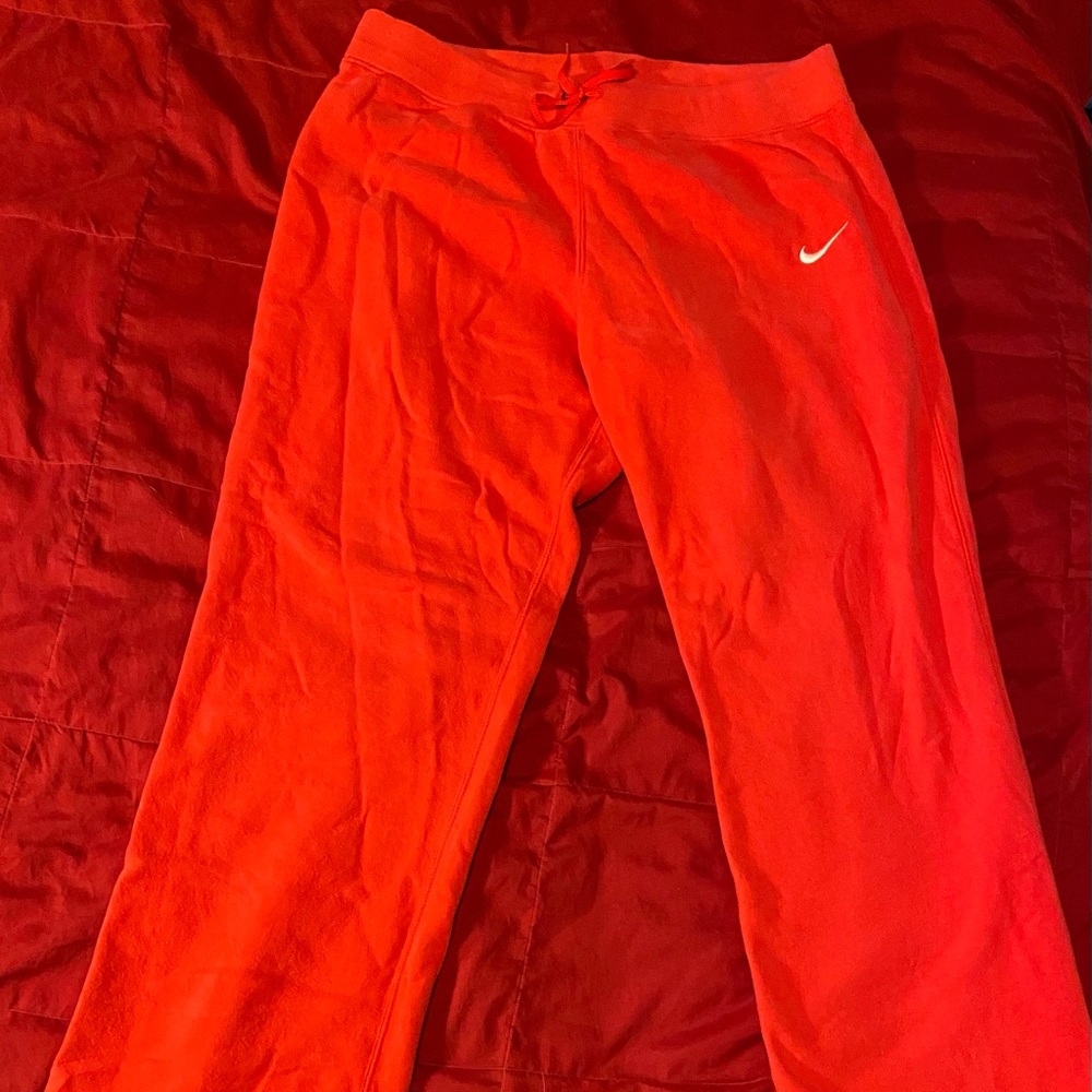 Large red Nike sweatpants
